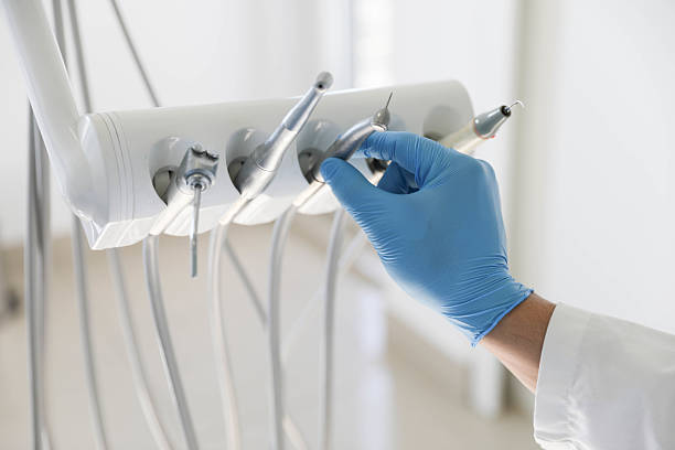 Professional Root Canal Treatment technician working in Skidway Lake, MI